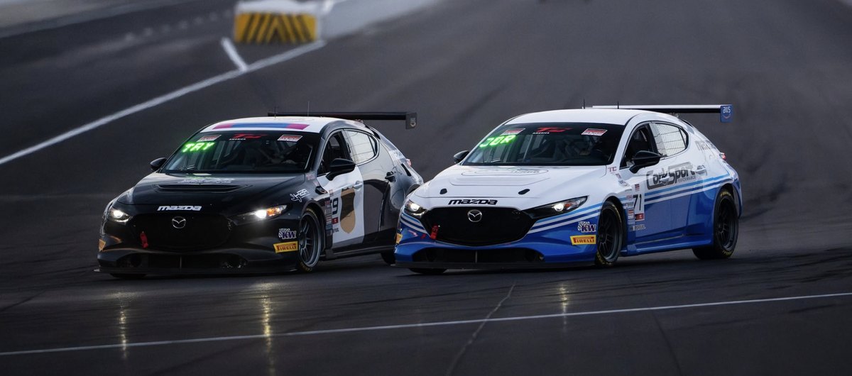 TCA Mazda3s racing wheel-to-wheel